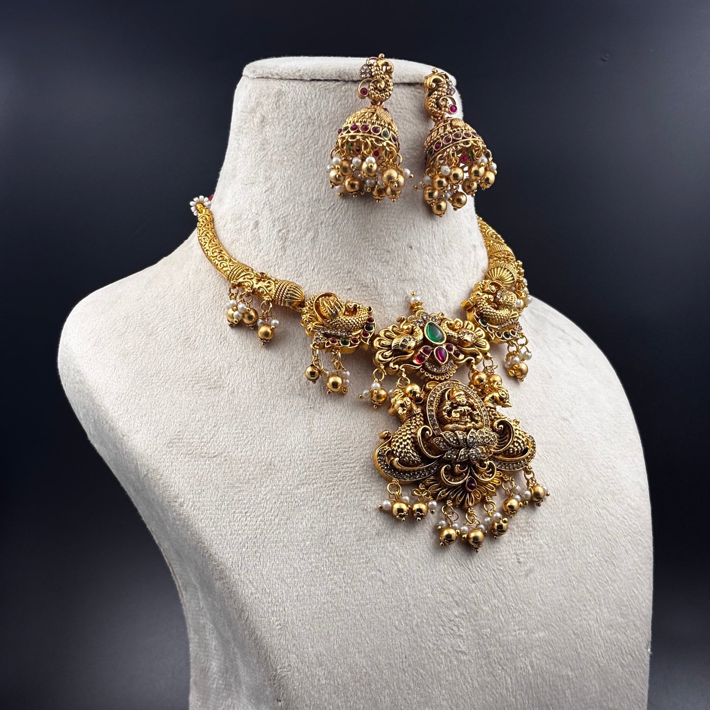 Traditional Gold-Plated Temple Jewellery Set with Jhumka Earrings, Antique Finish Necklace with Pearl Beads and Ruby Stones