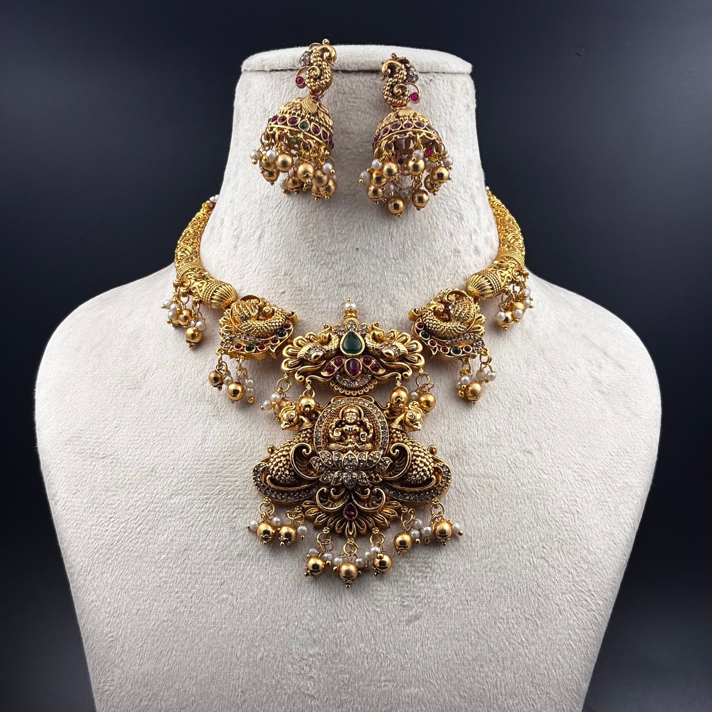 Traditional Gold-Plated Temple Jewellery Set with Jhumka Earrings, Antique Finish Necklace with Pearl Beads and Ruby Stones